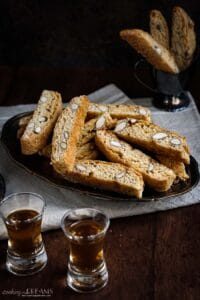 tray of cantucci with 2 shots of vin santo