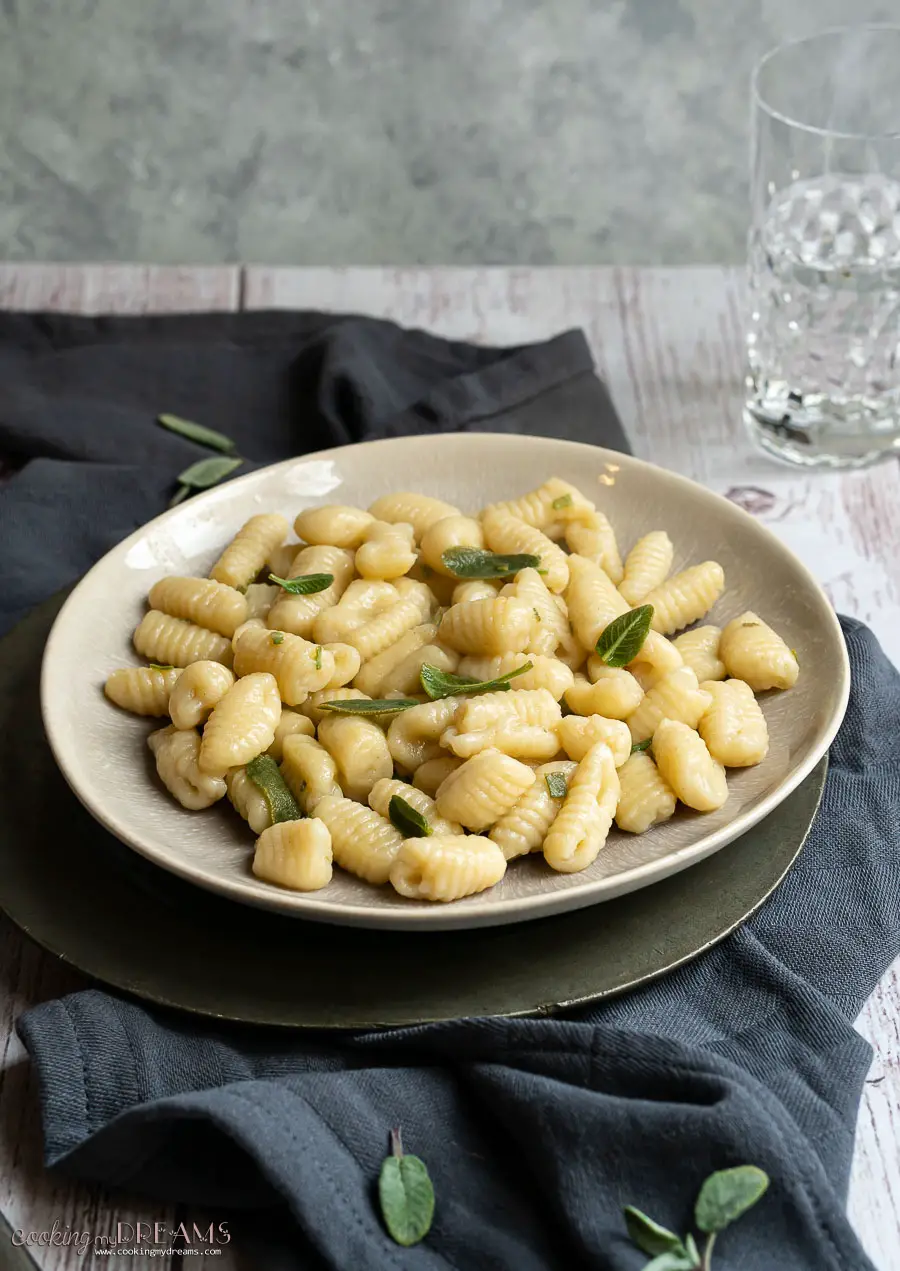 plate of potato gnocchi with butter and sage