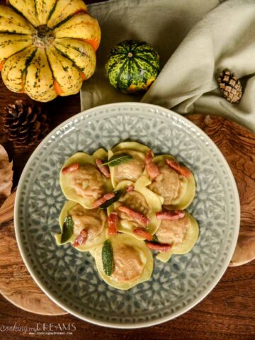 pumpkin ravioli on a plate.