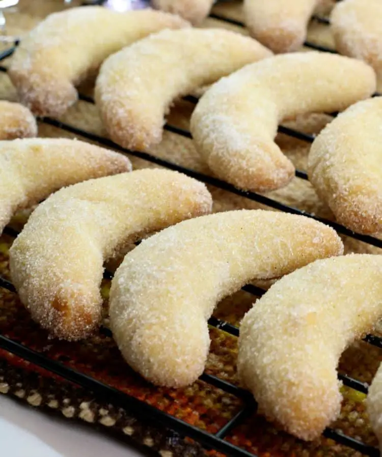 german crescent cookies laying on a cooling rack