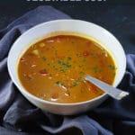 Overhead bowl of vegetable soup with garam masala spices