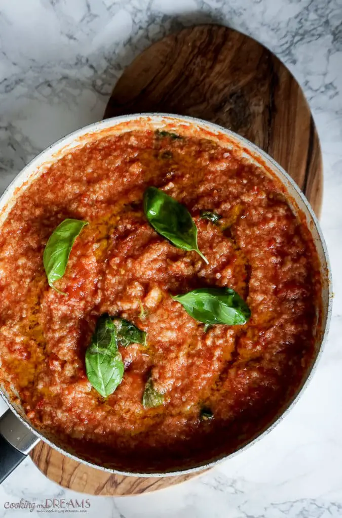 pan of italian bread and tomato dish pappa al pomodoro with basil