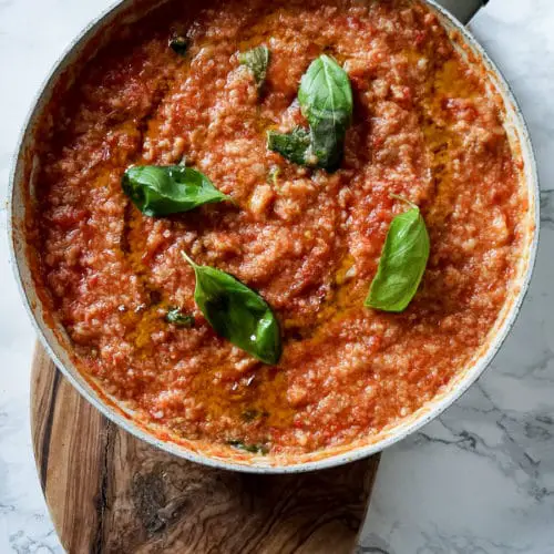 pan of italian bread and tomato dish pappa al pomodoro with basil