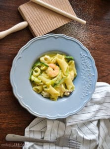 homemade garganelli pasta with seafood and zucchini