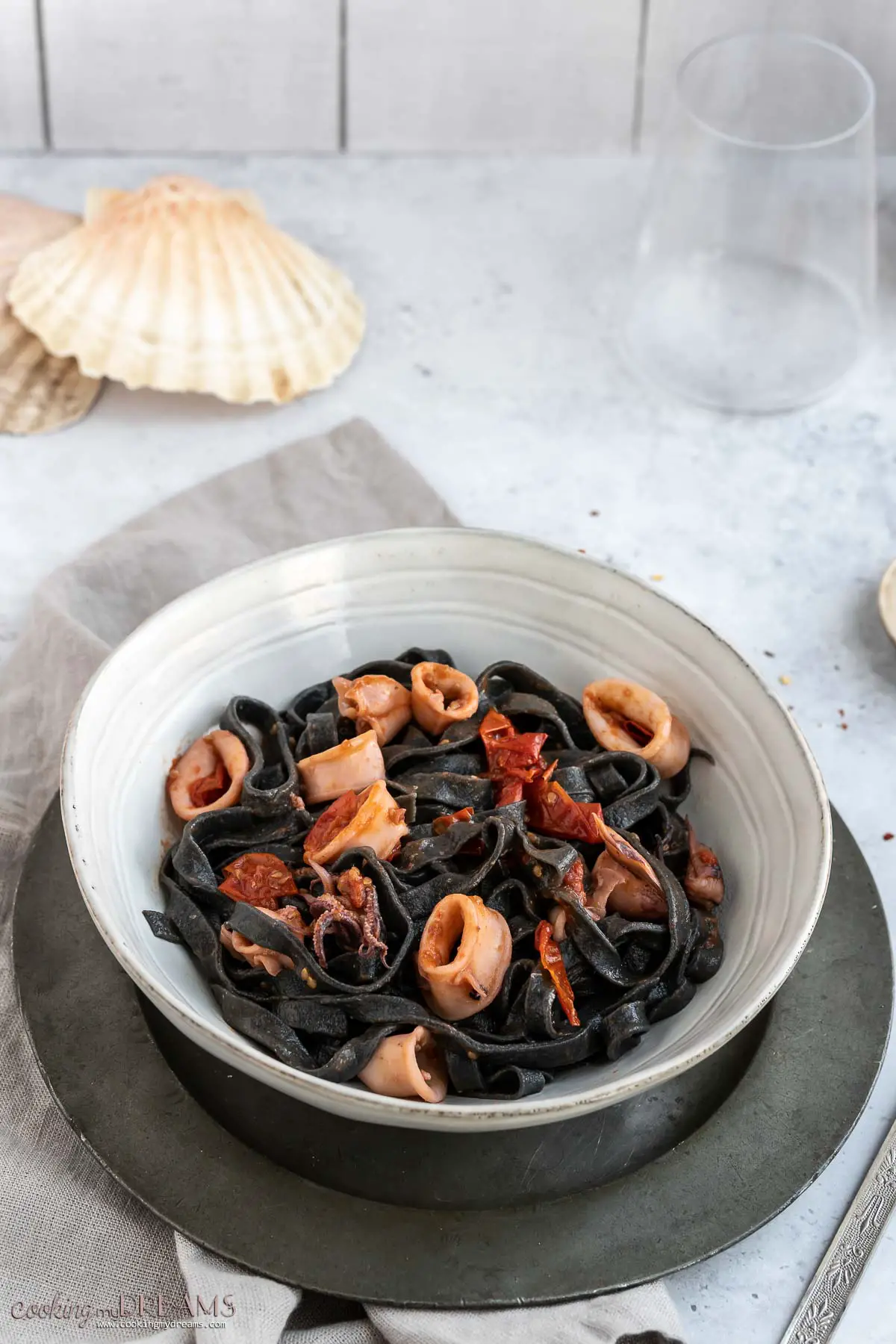 squid ink pasta with squids and tomatoes