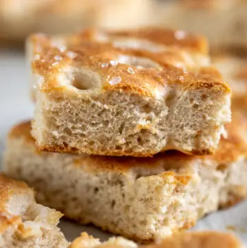close-up of stack of squares of focaccia bread