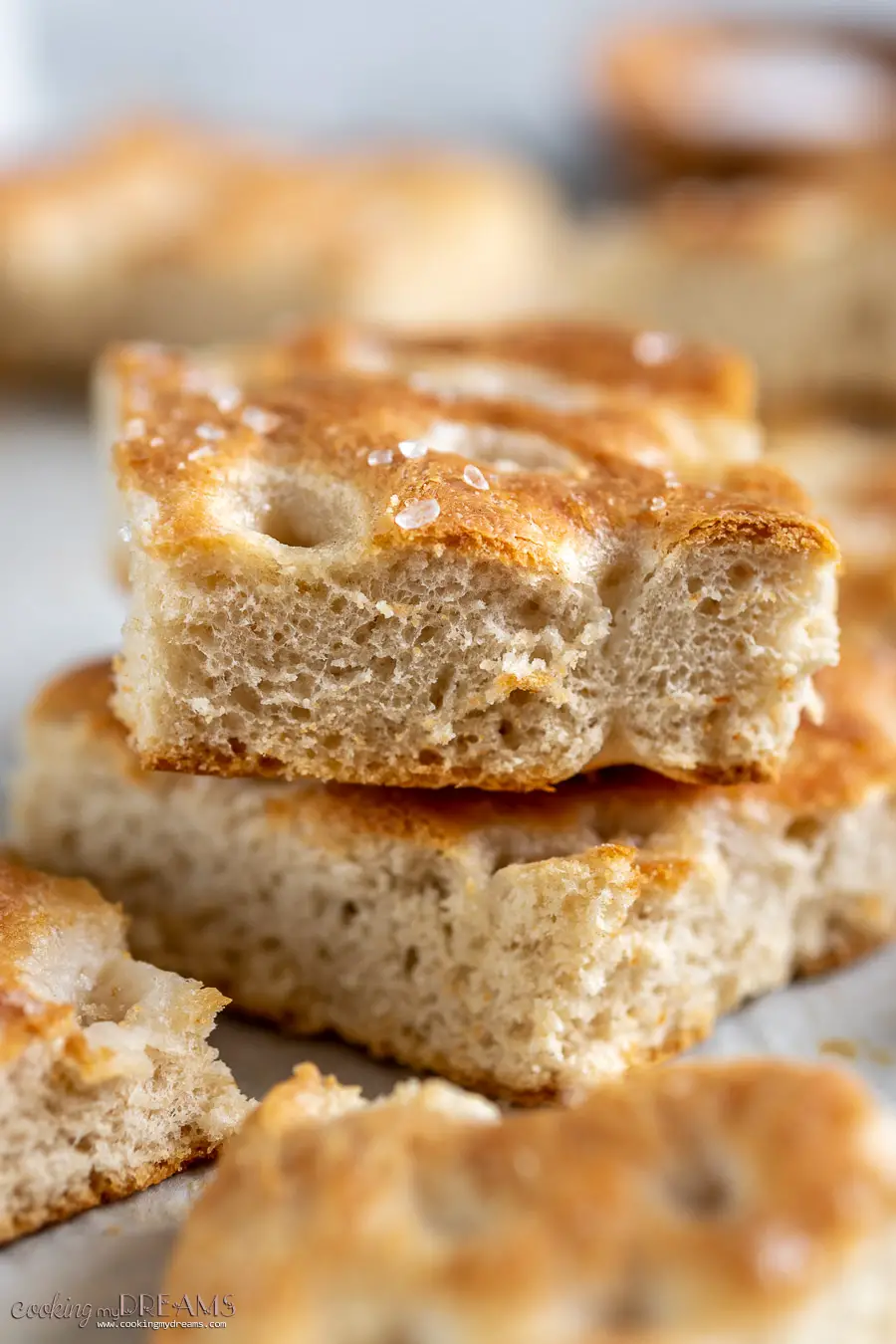close-up of stack of squares of focaccia bread