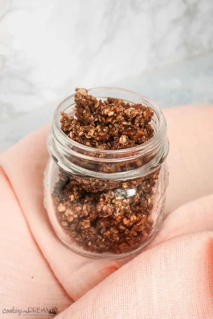 jar full of chocolate pecan granola clusters