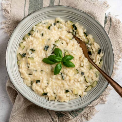 overhead bowl of risotto with a fork