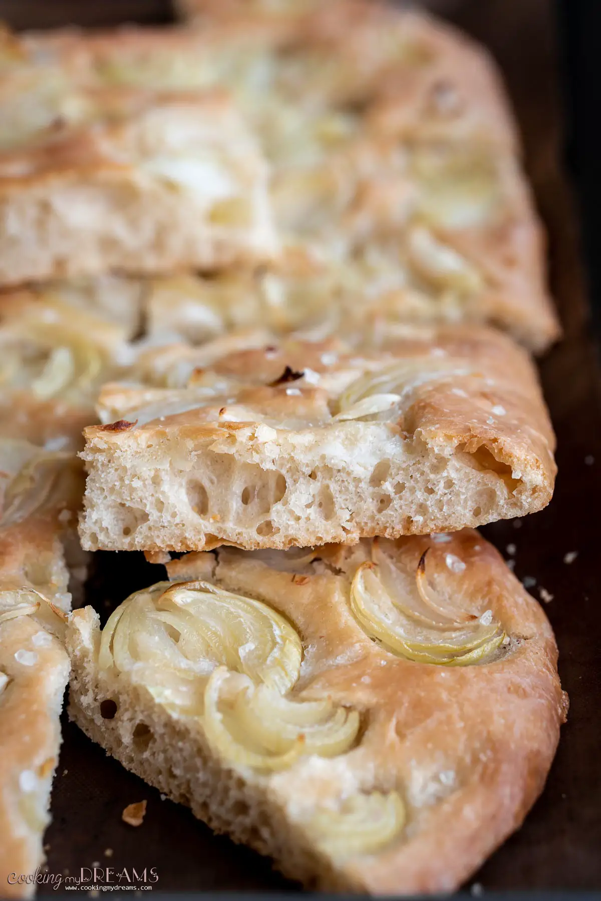 slice of focaccia bread with onions