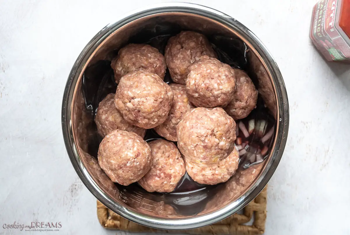 meatballs are layered inside the instant pot