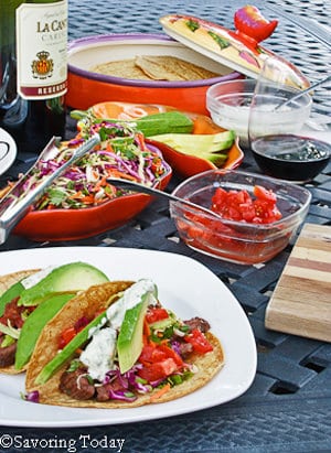 table with ingredients to make steak tacos