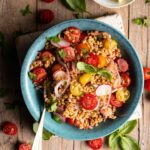 large bowl of farro salad with tomatoes