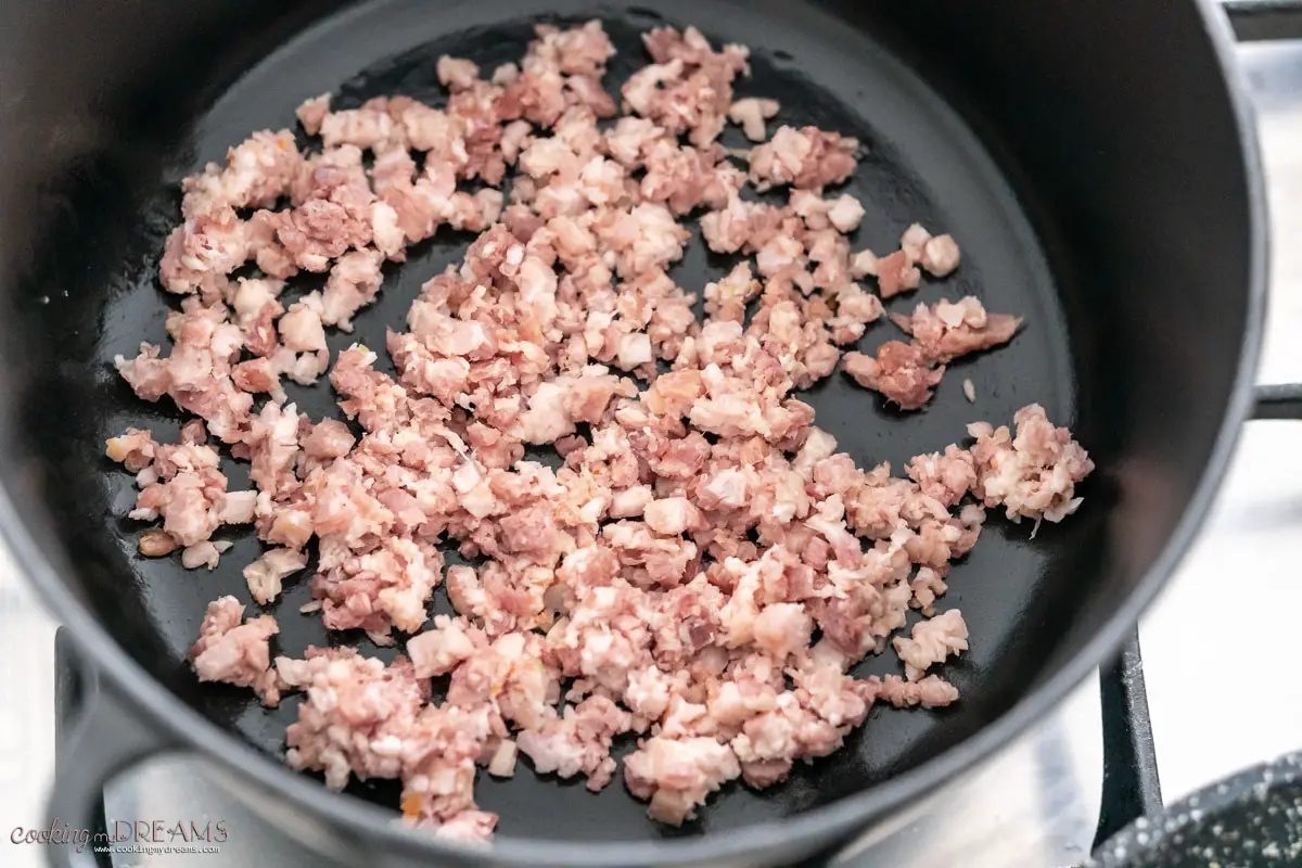 minced pancetta cooking in a pan