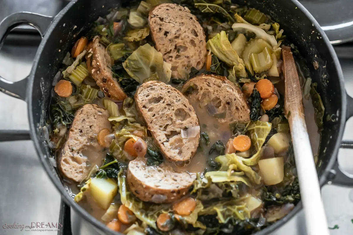 bread is added to the pot with the vegetables to make ribollita