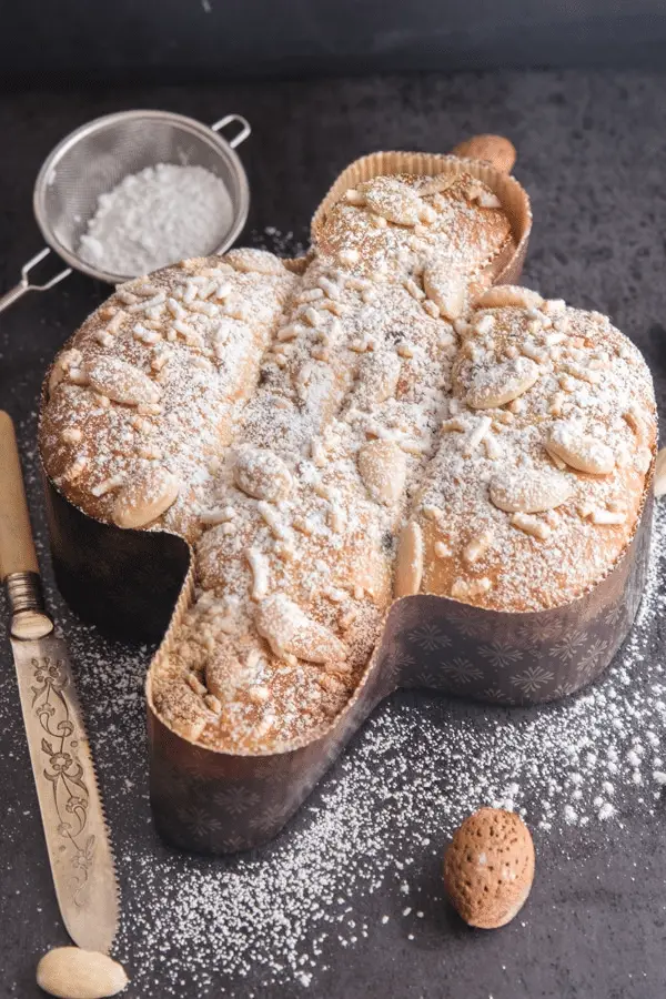 colomba cake on the table next to a knife