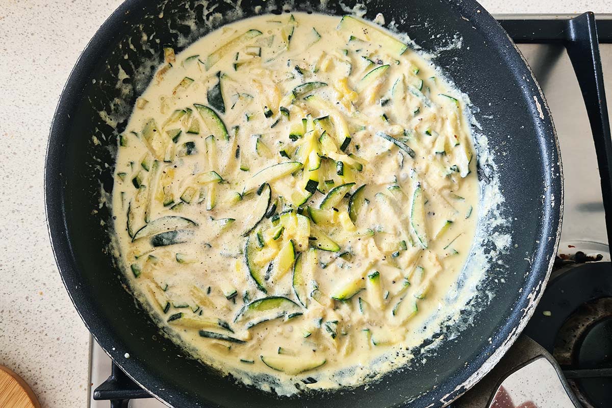 cream is added to the zucchini to make a creamy sauce.