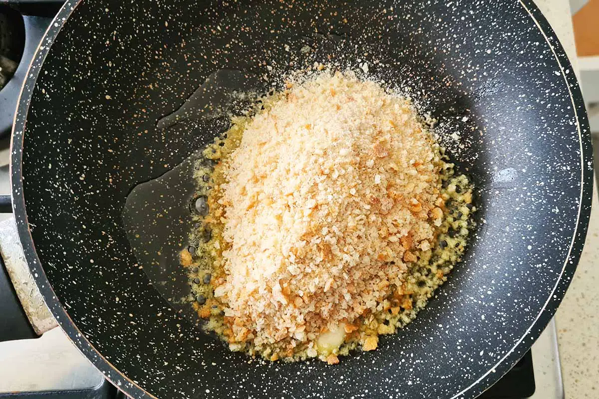 breadcrumbs in a pan with olive oil.