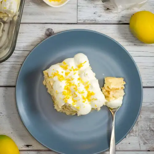 a slice of limoncello tiramisu in a plate with a fork.