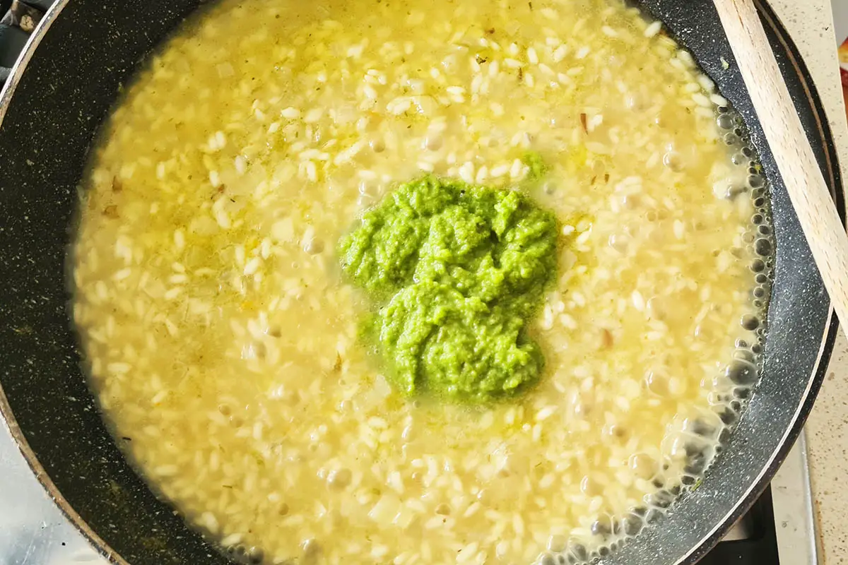 asparagus cream is added to the pan.