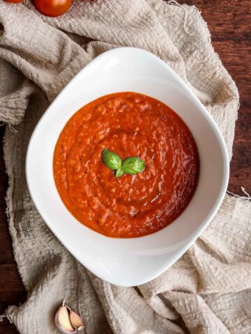 marinara sauce in a white bowl.