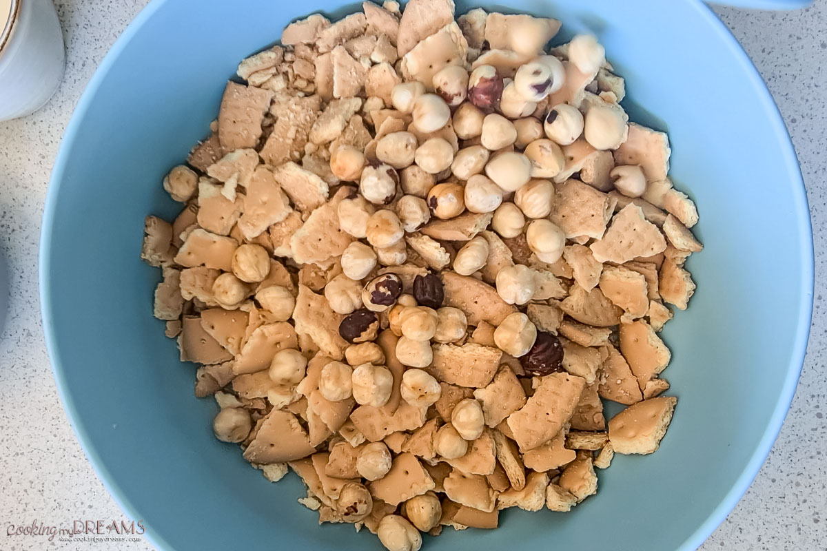crushed tea biscuits and hazelnuts in a bowl.