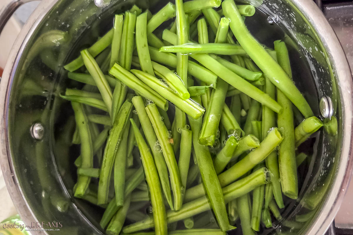 green beans boiling in a pot.