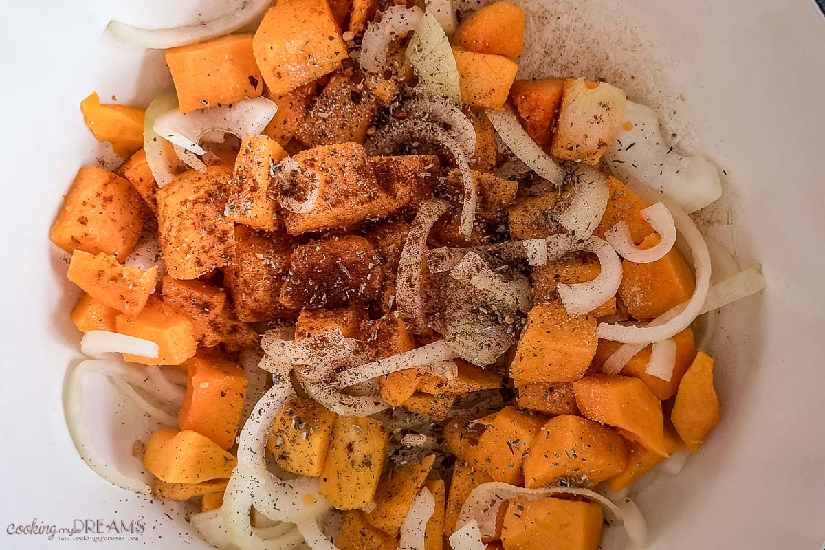 spices and seasonings added to the pumpkin and onions.