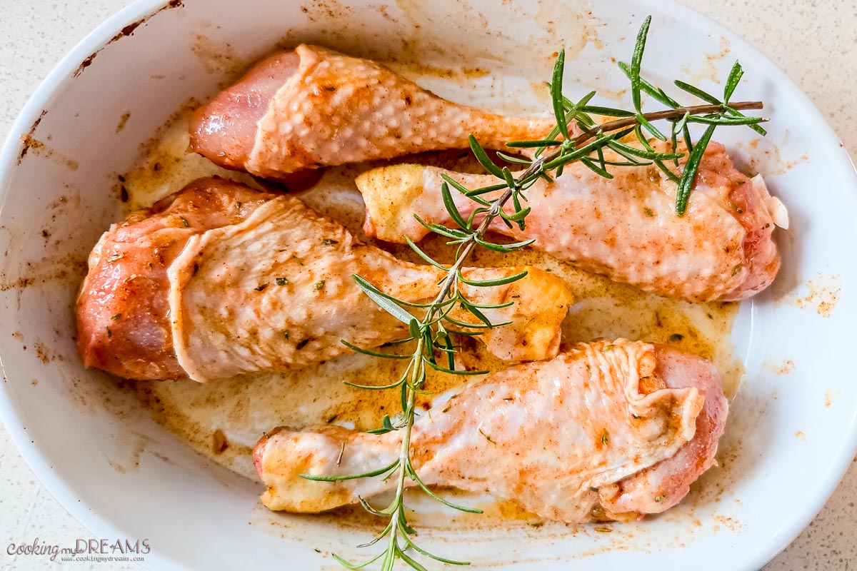 drumsticks marinating in the baking dish.