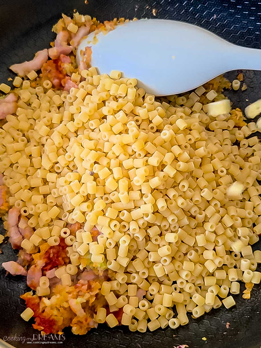 small pasta is added directly into the pan.