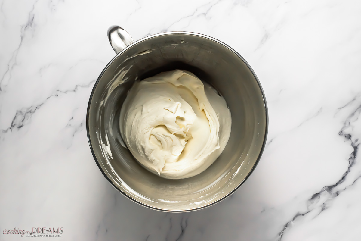 mascarpone cream in a metal bowl.