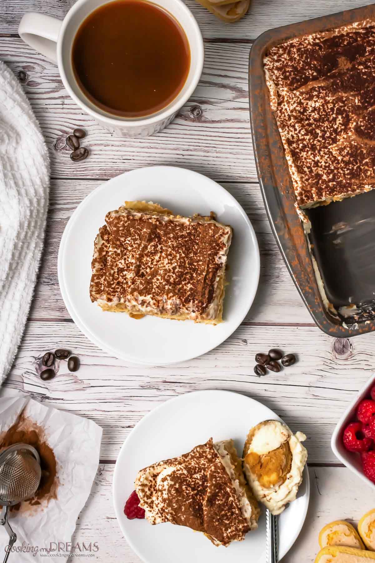 two plates with tiramisu next to the serving dish and ingredients.