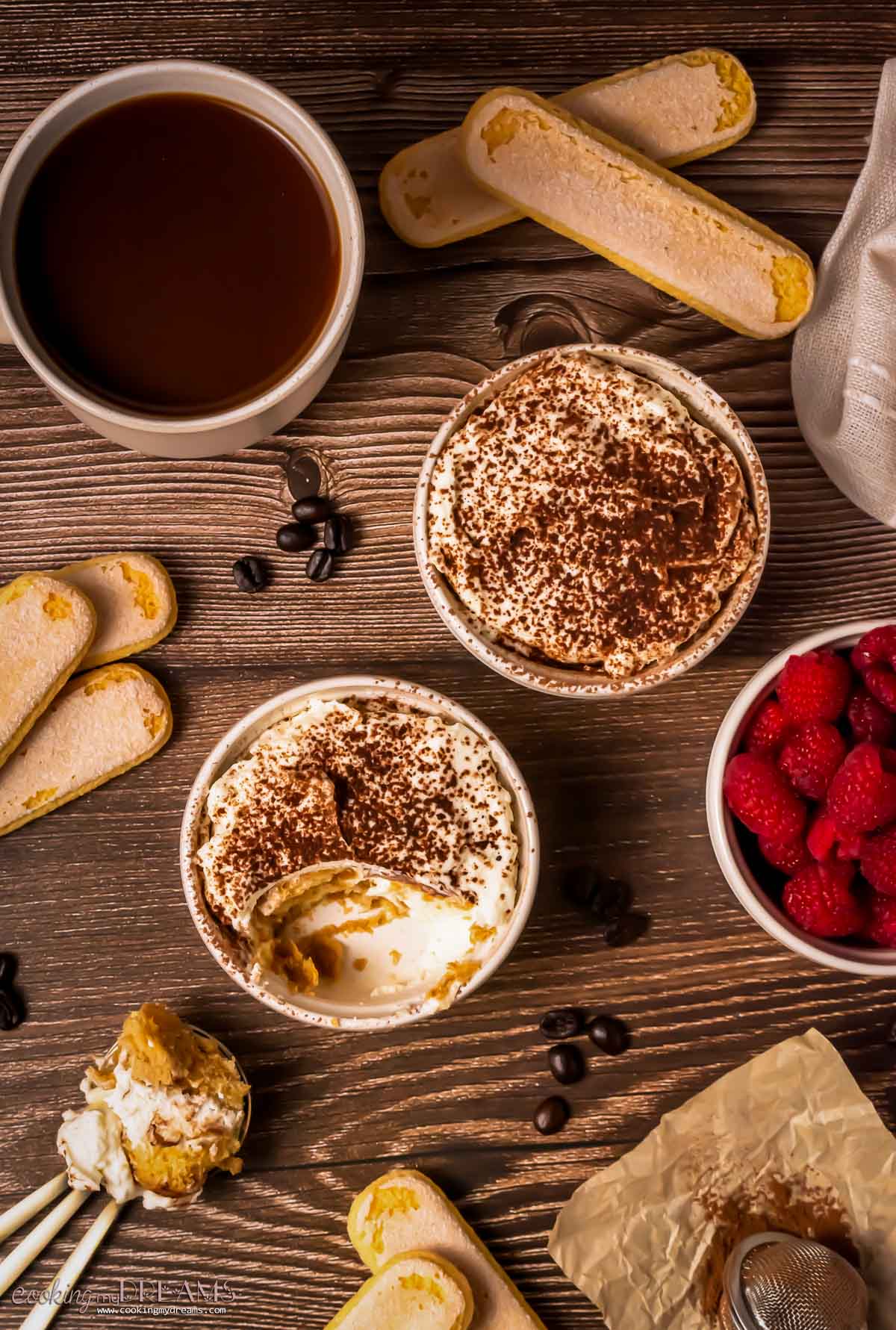 two small ramekins with single portions of tiramisu.