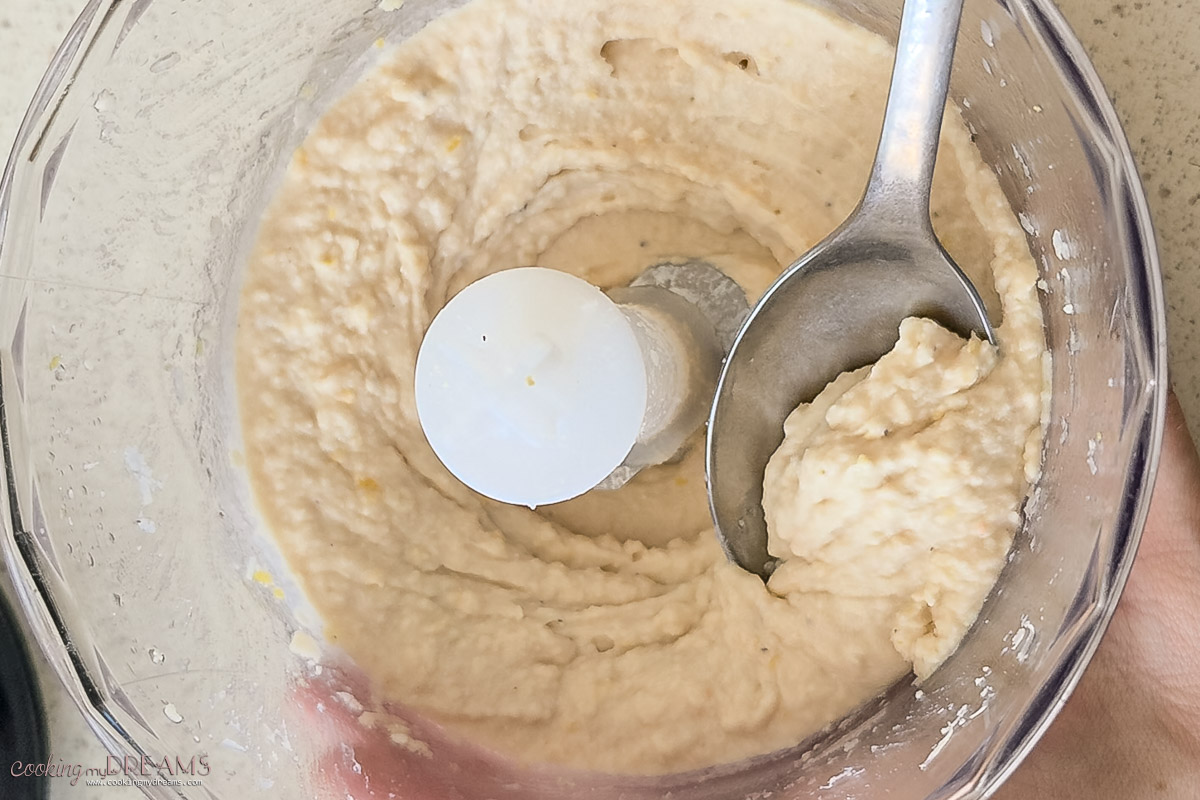 spoon taking a bit of cannellini dip.
