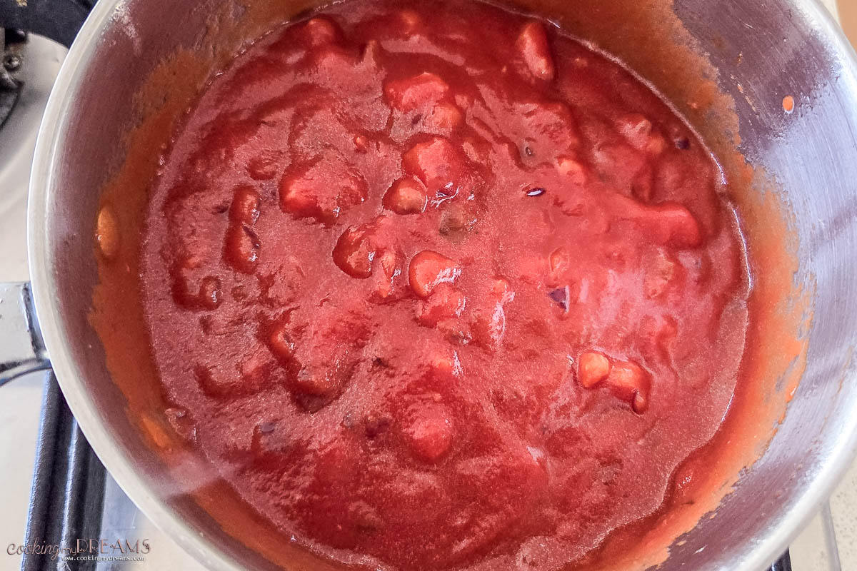 amatriciana sauce simmering in a pot.