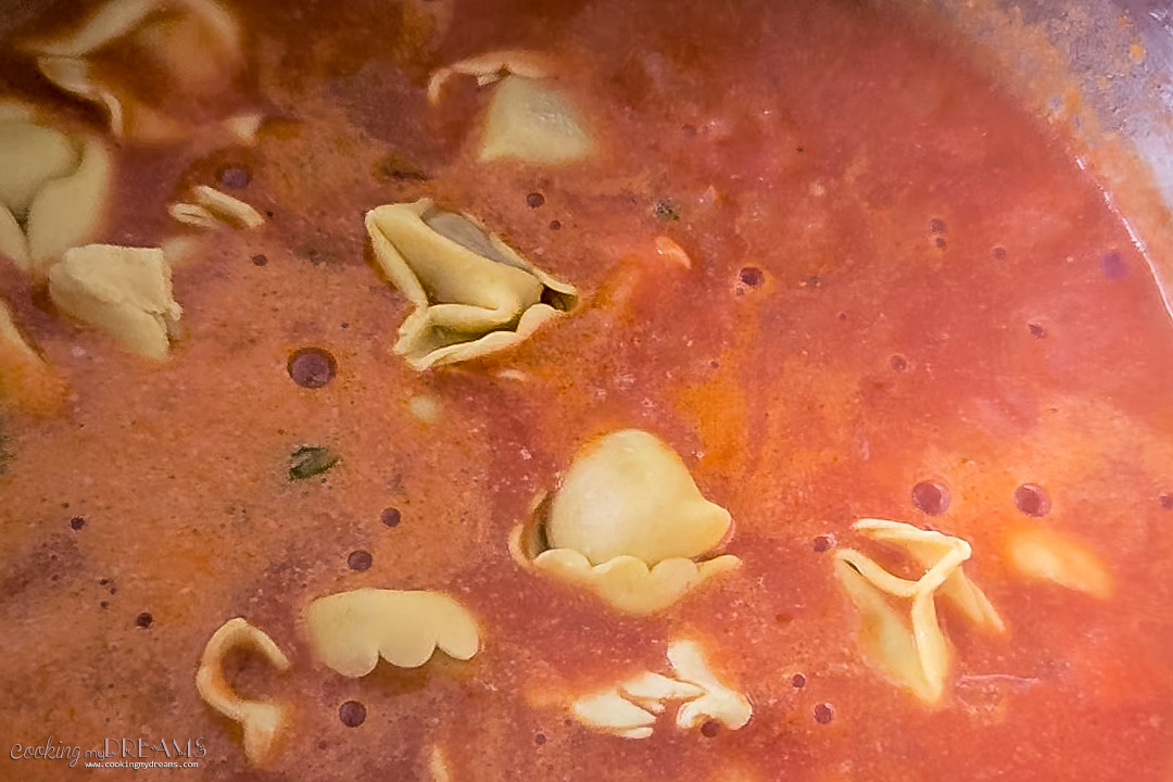 tortellini added to the tomato soup.