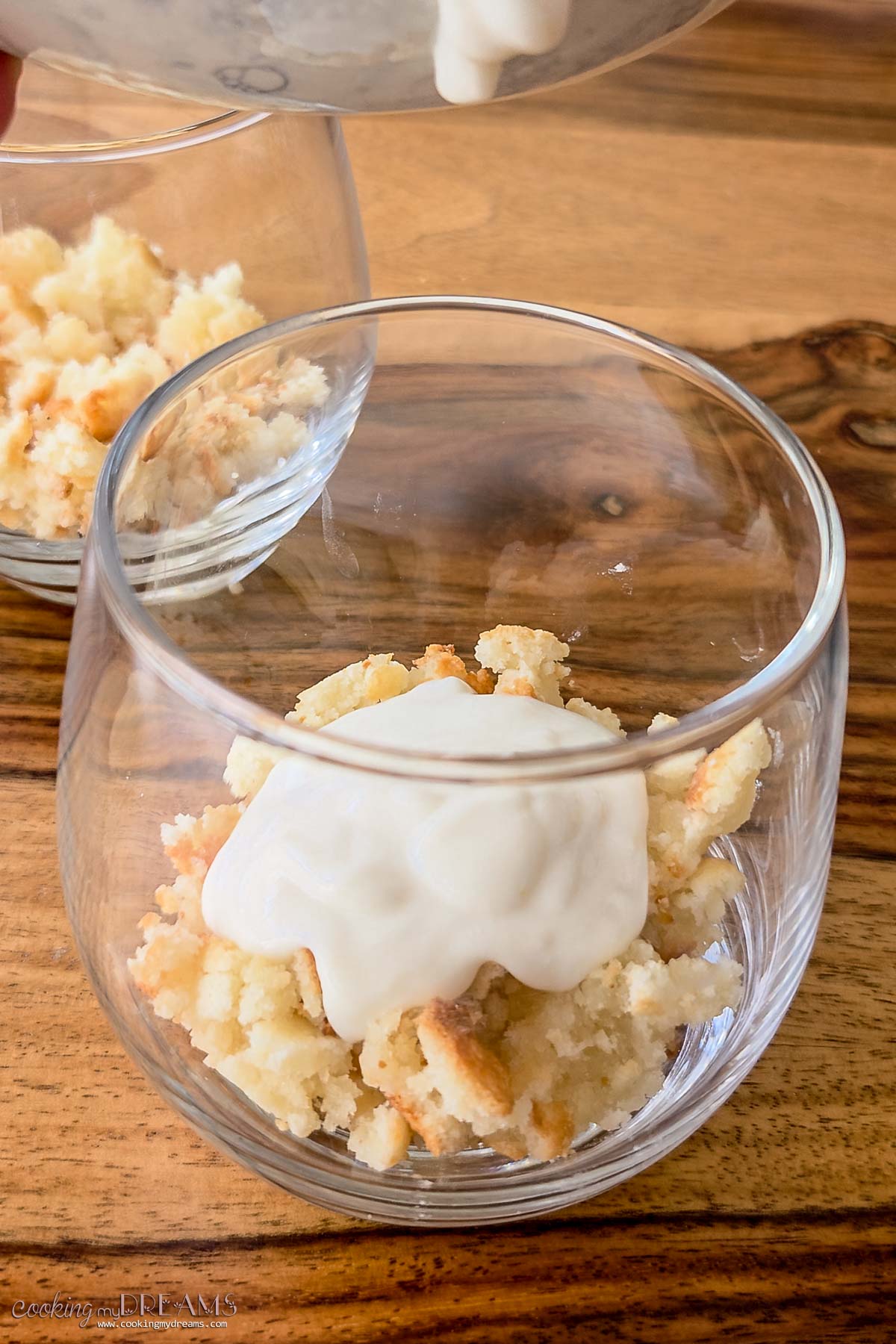 amaretti and ricotta layered in a glass.