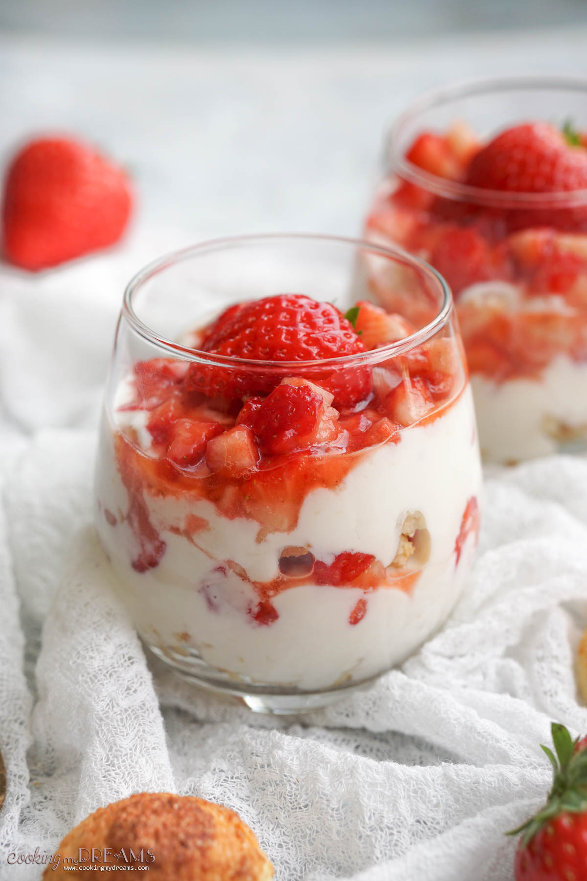 ricotta and strawberry dessert in a glass.
