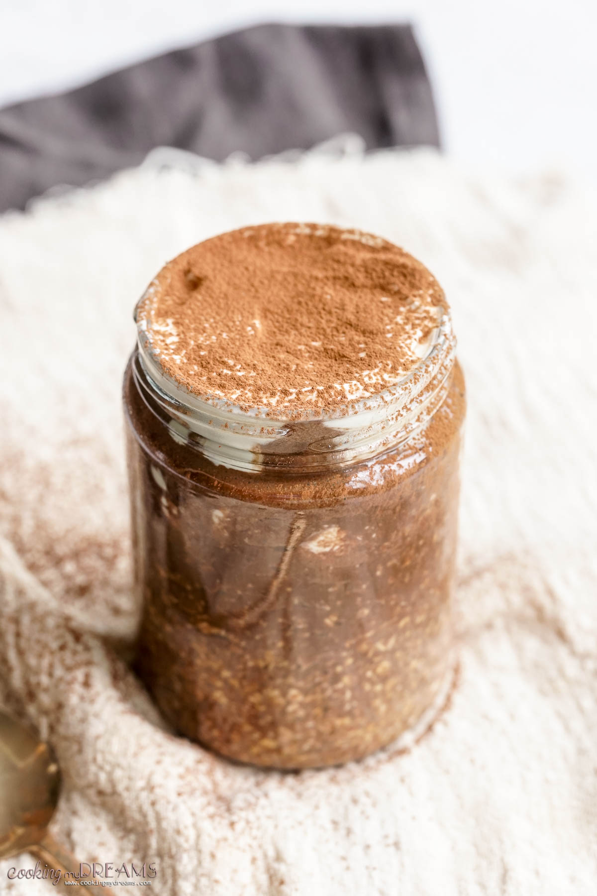 glass jar with tiramisu overnight oats.