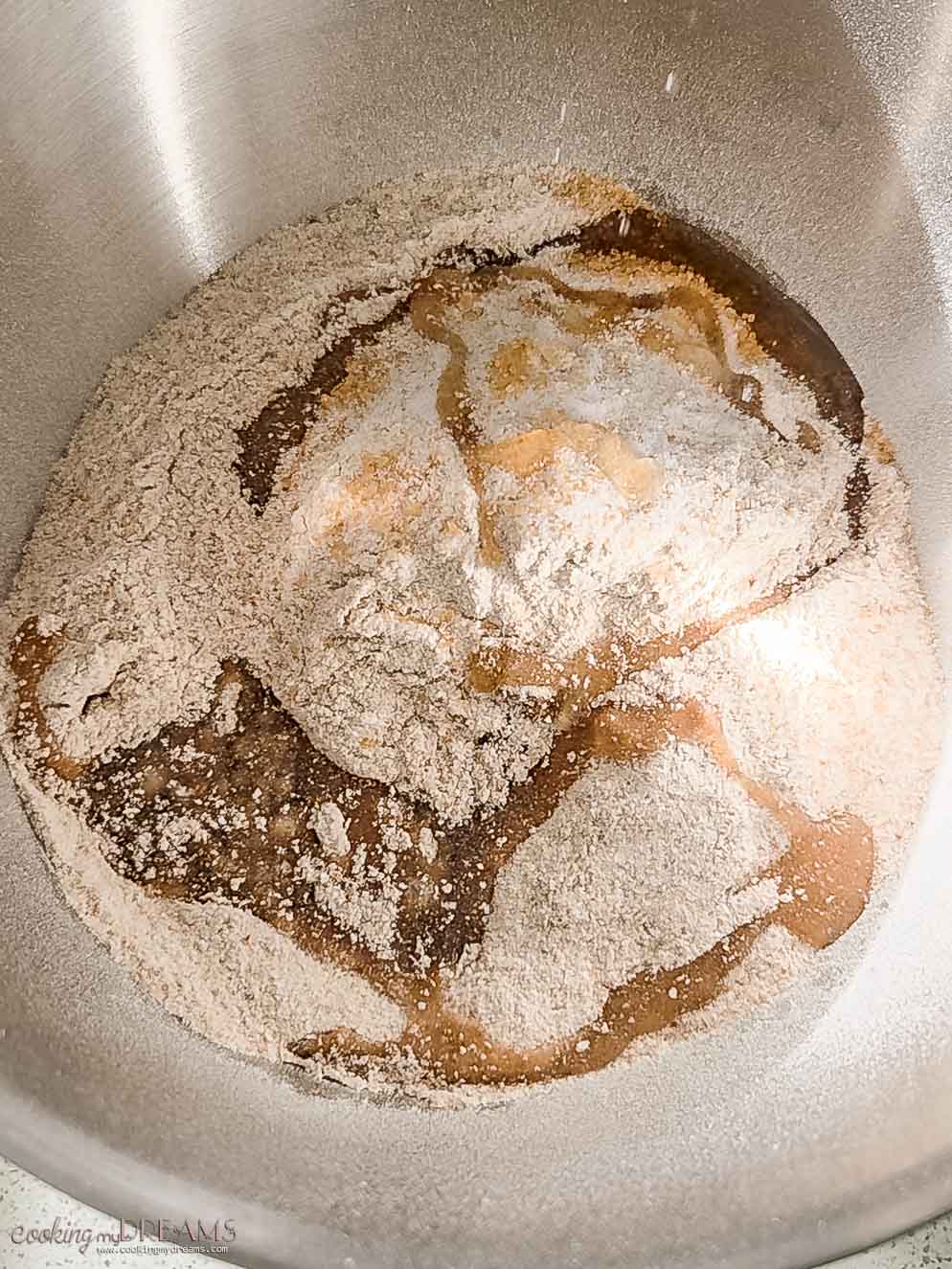 ingredients in a bowl to make whole wheat focaccia.