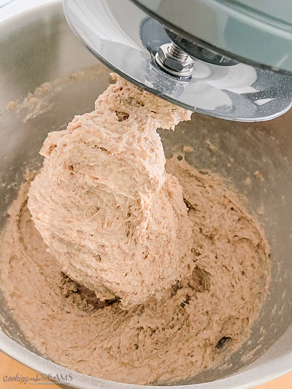 focaccia dough kneading in a stand mixer.